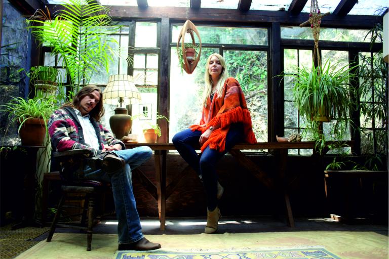Musicians Zervas and Pepper in a conservatory