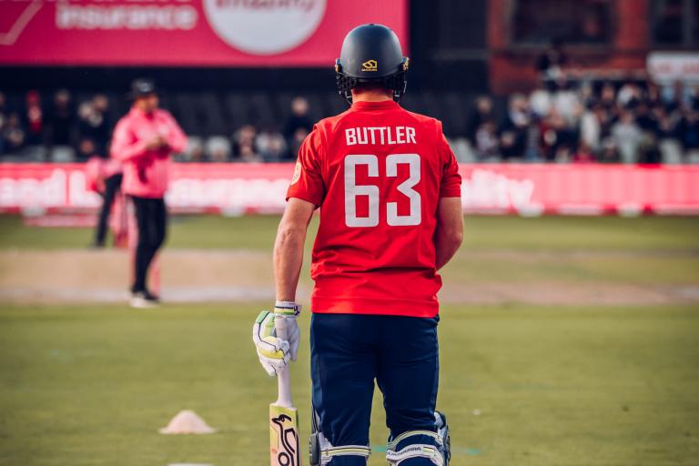 Jos Buttler walking out to bat