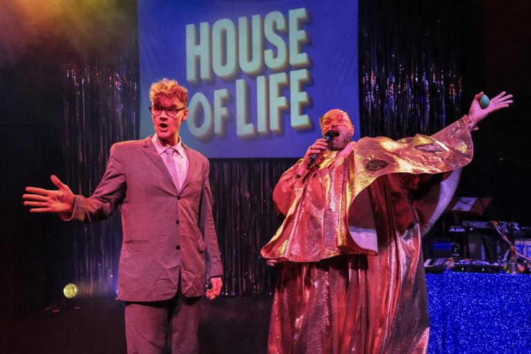 Two men performing on stage