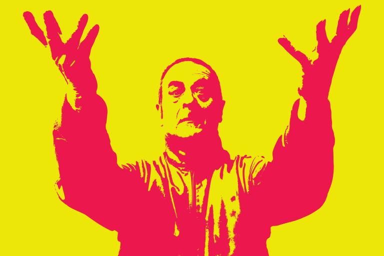 A photograph of comedian Mark Thomas but in red on a yellow background