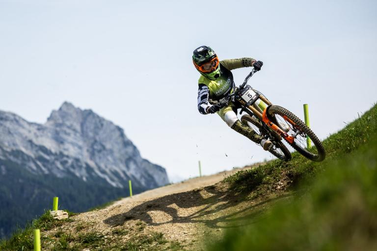 Mountain biker Danny Hart cycling down a hill
