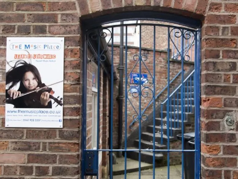 A gate at the entrance to The Music Place
