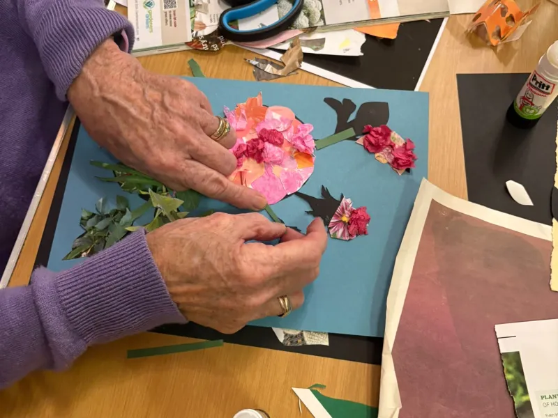 Hands having a go at paper collage, inspired by Mary Delany