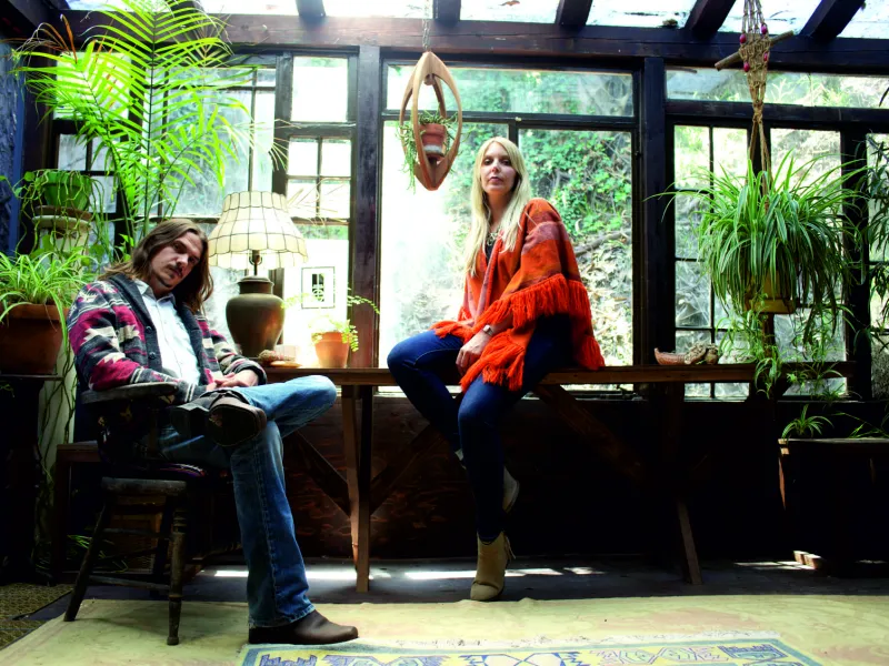 Musicians Zervas and Pepper in a conservatory