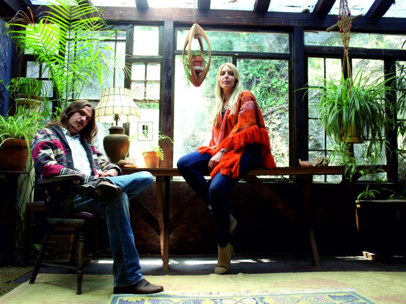 Musicians Zervas and Pepper in a conservatory