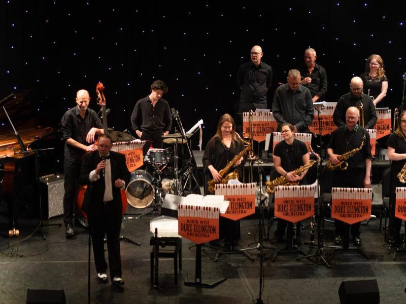 The North West Duke Ellington Orchestra performing on stage