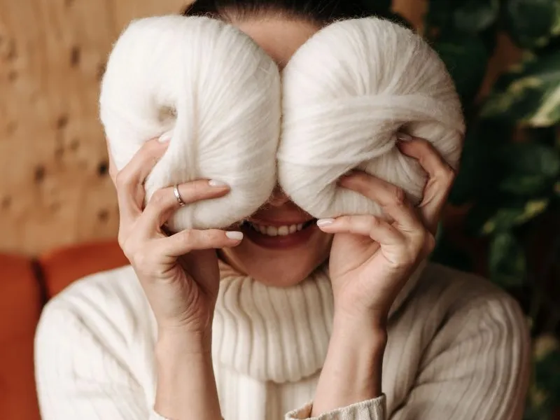 Funny woman with ball of wall for eyes