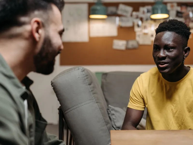 Two men talking