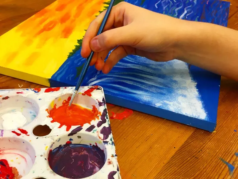 Photo of paint palette and painting