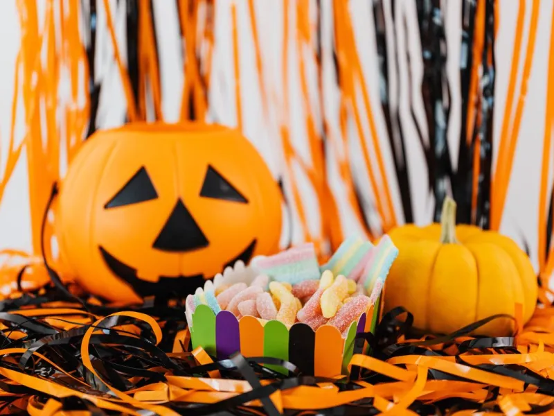 Halloween themed decorations and party sweets.