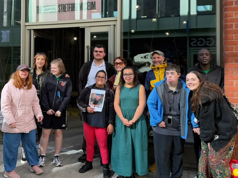 Group outside the Unofficial Stretford Museum 