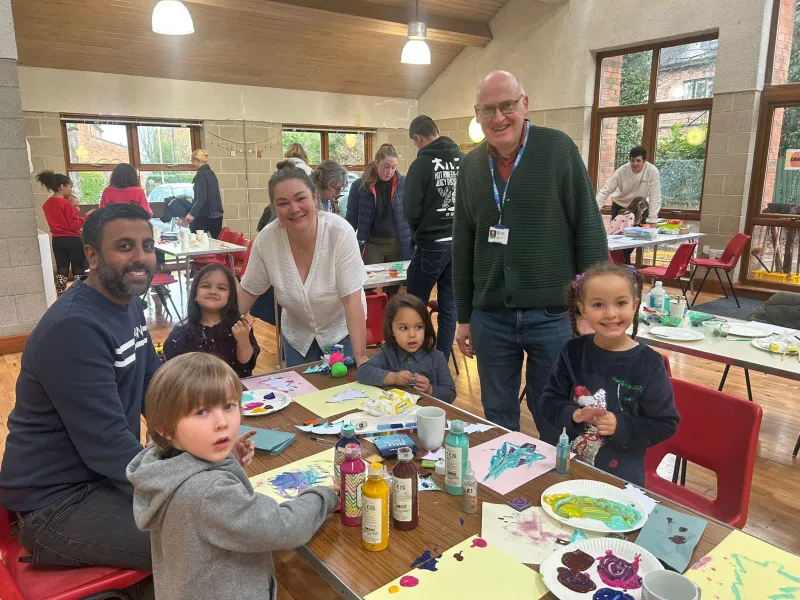 Children gathered around one of the crafts