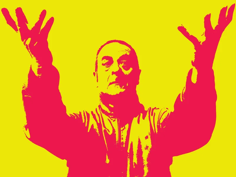 A photograph of comedian Mark Thomas but in red on a yellow background