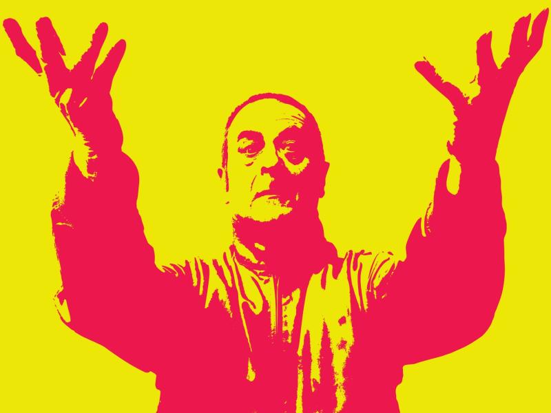A photograph of comedian Mark Thomas but in red on a yellow background