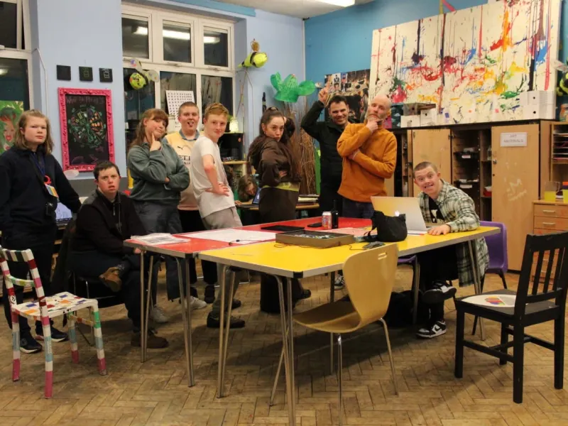 People around a craft table