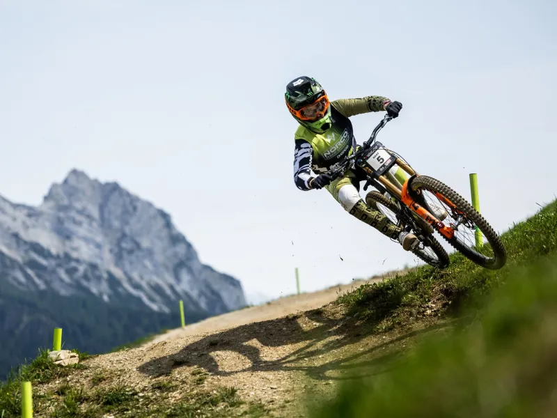 Mountain biker Danny Hart cycling down a hill